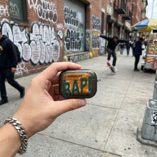 APE Orange Camo AirPods Case – Streetwear Camouflage Protective Cover